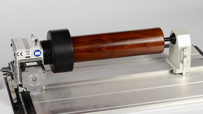 Laser engraving cylindrical objects, columns