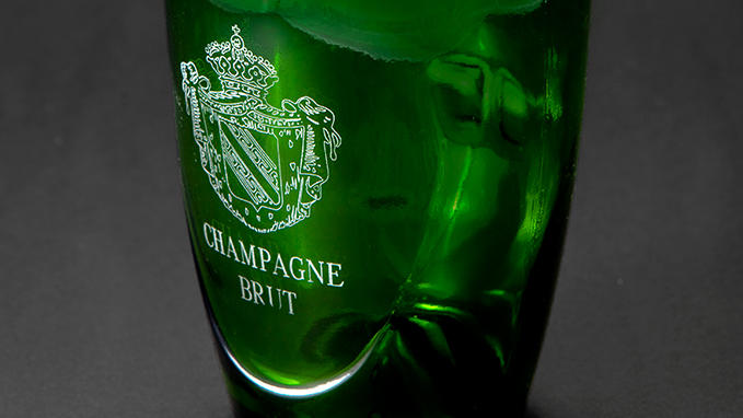 Engraving and personalization of glass bottles